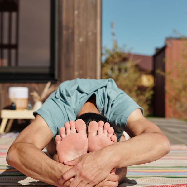 Focused man meditating after a strength workout session.